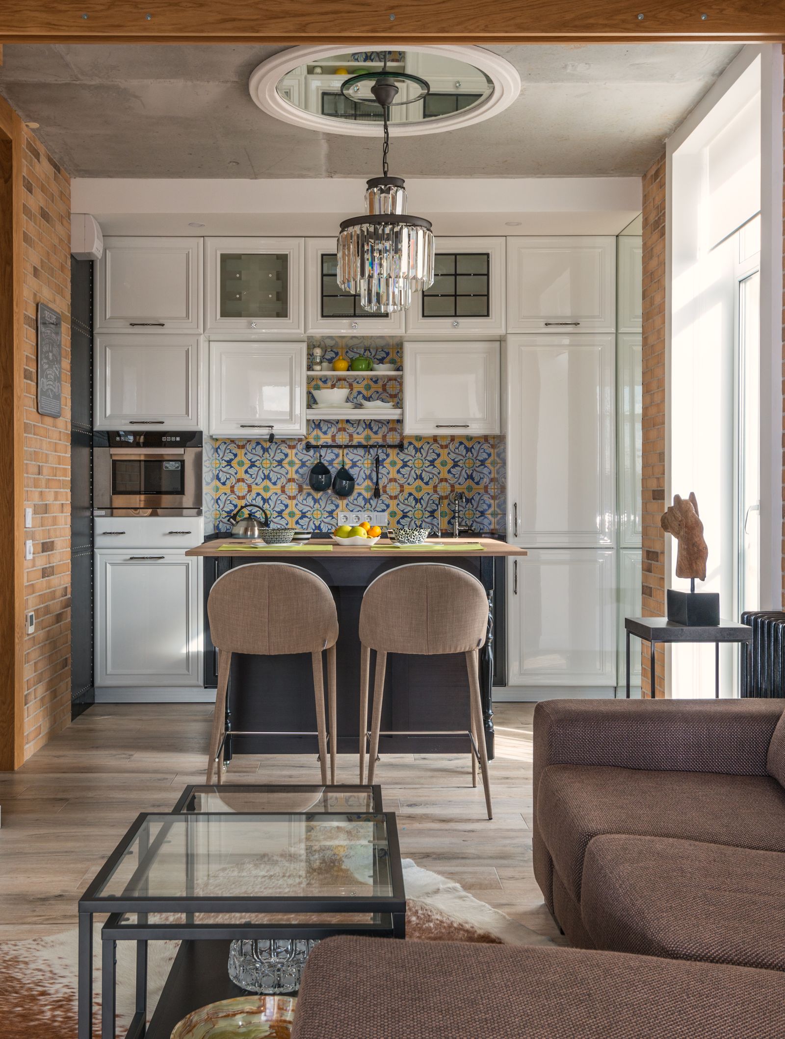 Dining area with a long wood table and mixed seating